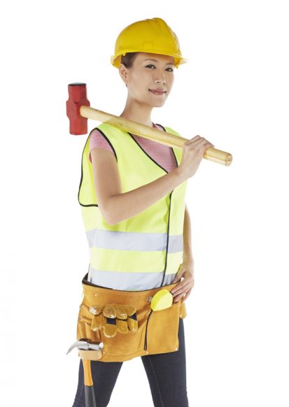 Woman with construction equipment